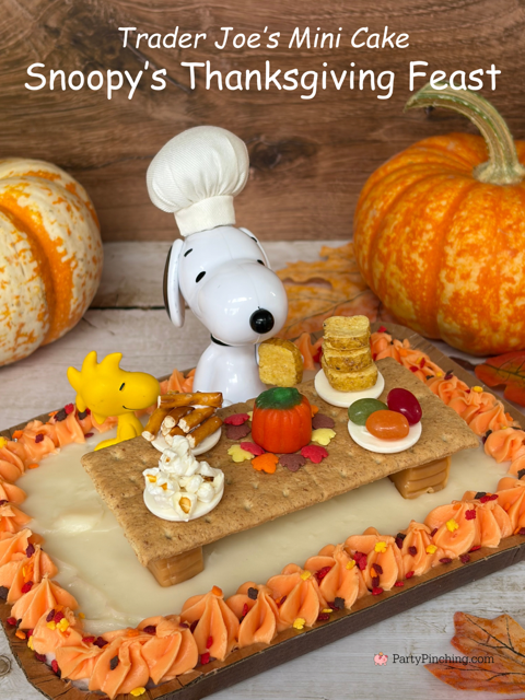 Snoopy's Thanksgiving Dinner Cake, Snoopy's Thanksgiving Feast, Snoopy Trader Joe's Mini Cake, Trader Joe's Mini Thanksgiving Cake, A Charlie Brown Thanksgiving, Snoopy, Charlie Brown, Woodstock, Jelly beans popcorn pretzels toast Thanksgiving dinner, easy no bake Thanksgiving dessert, Thanksgiving ideas for kids, best easy Thanksgiving recipes